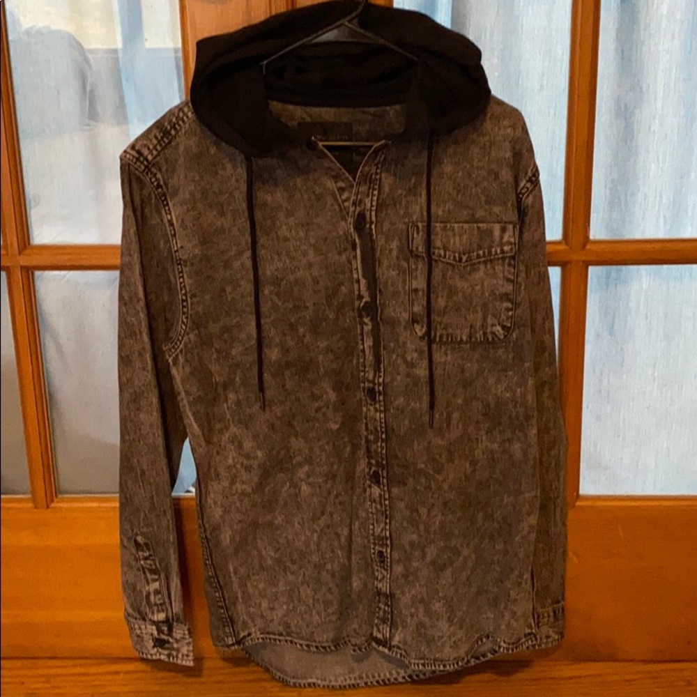 Grey light jean shirt with black hood.